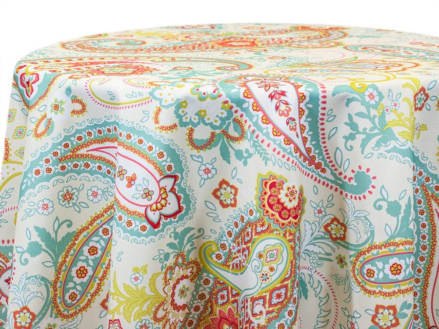 Colorful paisley tablecloth with intricate patterns.