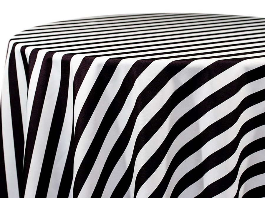 Black and white striped fabric draped on a surface.