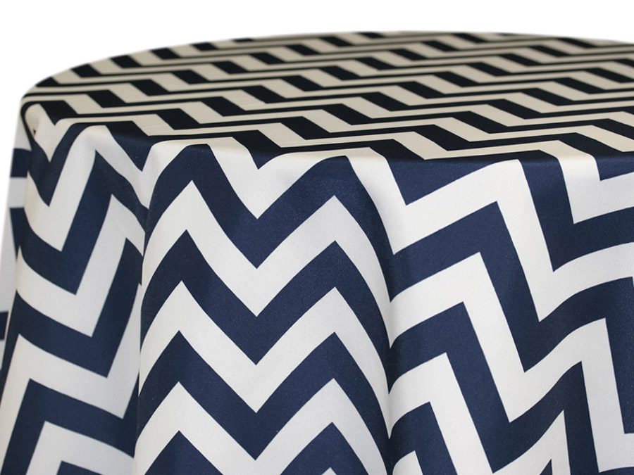 Blue and white chevron patterned tablecloth on a rectangular table.