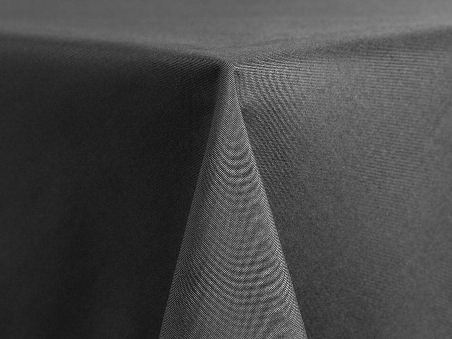 Close-up of a black fabric corner with a smooth texture.