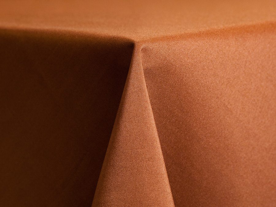 Close-up of a brown fabric corner with sharp folds.