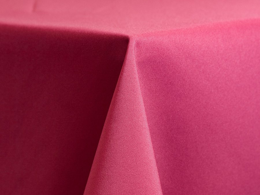 Close-up of a pink fabric draped over a surface.