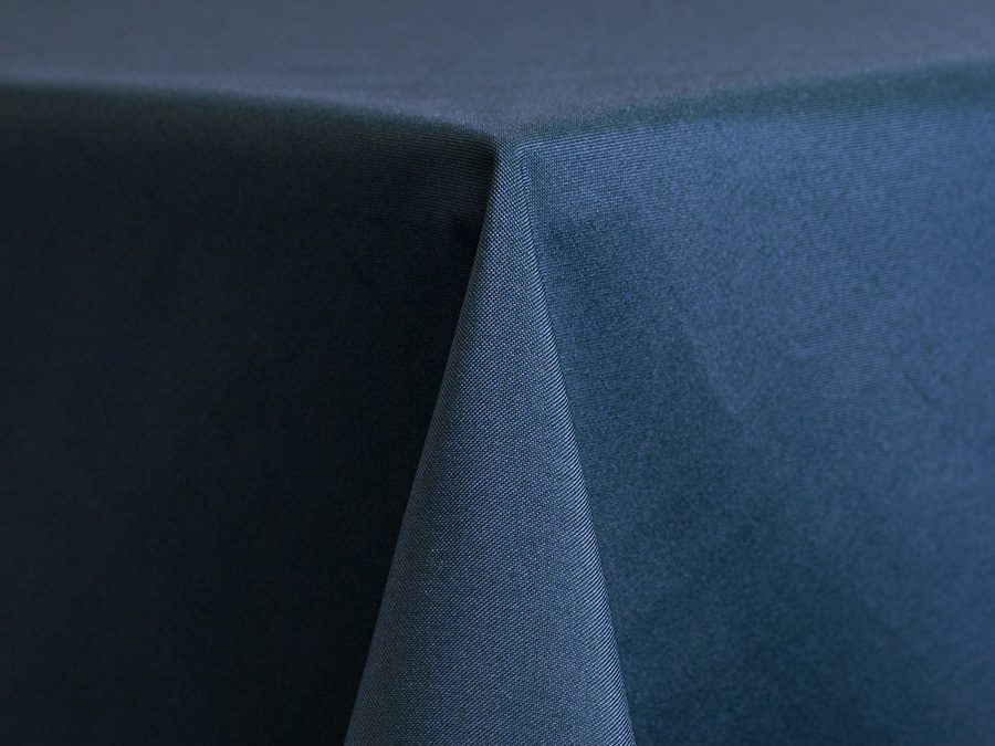 Close-up of two tablecloths with different shades of blue.